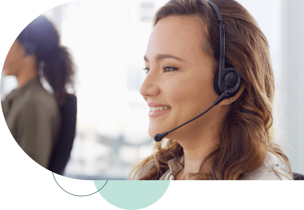 young woman smiling and wearing headset
